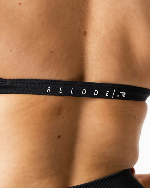 Hybrid Seamless Halterneck Sports Bra · Jet Black