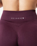 Hybrid Seamless Scrunch Flared Tights - Fig Red
